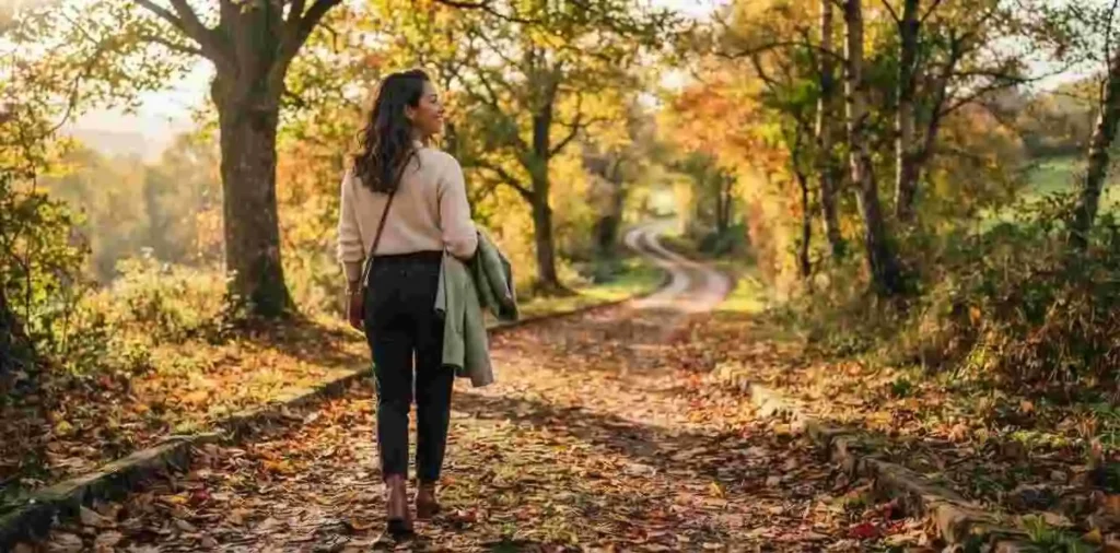 Woman exploring a scenic autumn destination